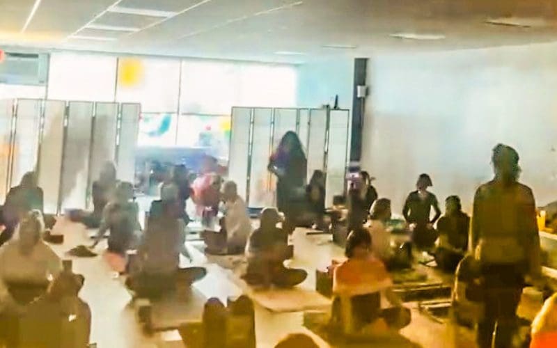 Indoor group yoga class with instructor